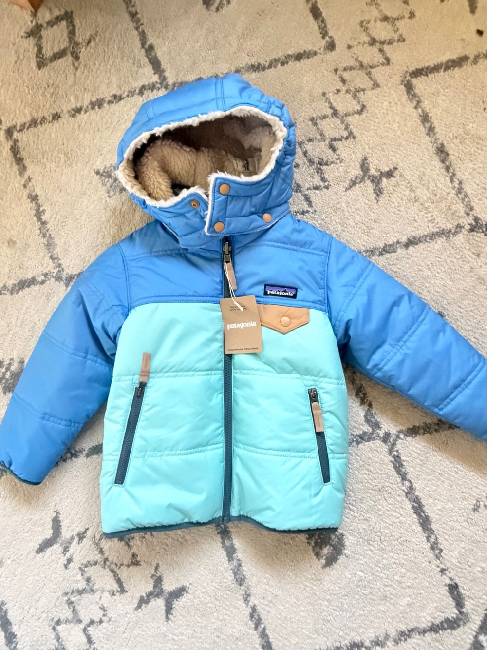 Patagonia Kids Two-Tone Light and Sky Blue baby reversible tribales jacket